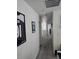 Hallway boasting white walls, neutral carpet and modern decor at 18006 E 103 Ave, Commerce City, CO 80022