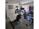 Spacious office featuring multiple work spaces and natural light at 18006 E 103 Ave, Commerce City, CO 80022