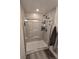 Modern bathroom showcasing a glass enclosed walk-in shower with new fixtures at 18006 E 103 Ave, Commerce City, CO 80022
