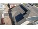 Aerial view of a home with solar panels, situated in a residential neighborhood at 18006 E 103 Ave, Commerce City, CO 80022