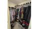 This walk-in closet is complete with shelving and rods for optimal storage at 18006 E 103 Ave, Commerce City, CO 80022