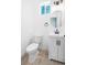 Cozy bathroom features a new toilet, vanity, and modern fixtures at 5470 Krameria St, Commerce City, CO 80022