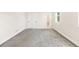 Bright bedroom features neutral walls, carpet, and an ensuite bathroom at 5470 Krameria St, Commerce City, CO 80022