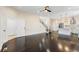 Spacious open-concept layout connecting the living area with the modern kitchen, ideal for entertaining and Gathering gatherings at 5470 Krameria St, Commerce City, CO 80022