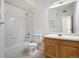 Clean bathroom with tub and shower, toilet, sink and vanity at 905 S Zeno Way # 204, Aurora, CO 80017