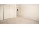 Neutral carpeted bedroom features closet storage at 905 S Zeno Way # 204, Aurora, CO 80017