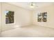 Serene bedroom with bright windows offering natural light and a spacious feel at 905 S Zeno Way # 204, Aurora, CO 80017