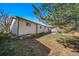 A single-Gathering home with a spacious backyard and a well-maintained exterior at 9231 W Louisiana Ave, Lakewood, CO 80232