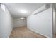 Finished basement space with neutral carpet at 9231 W Louisiana Ave, Lakewood, CO 80232