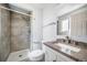 Bathroom with shower, toilet, and sink with granite countertop at 9231 W Louisiana Ave, Lakewood, CO 80232