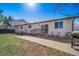 This home features a patio with a grill for outdoor cooking at 9231 W Louisiana Ave, Lakewood, CO 80232