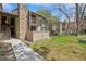 Exterior of property showcasing the balcony, chimney, and sidewalk leading up to entrance at 7720 W 87Th Dr # J, Arvada, CO 80005
