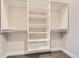 Spacious walk-in closet featuring built-in shelving and plenty of storage for organizing clothes at 268 Simmental Loop, Castle Rock, CO 80104
