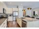 A bright kitchen featuring granite countertops, stainless appliances, and hardwood floors at 268 Simmental Loop, Castle Rock, CO 80104