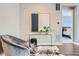 Cozy sitting area with comfortable chair, glass table, and stylish decor at 268 Simmental Loop, Castle Rock, CO 80104