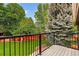 Relax on the deck with this picturesque view of the large, lush backyard at 6338 S Oneida Ct, Centennial, CO 80111