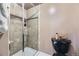 This bathroom has a tiled shower and a black toilet at 6338 S Oneida Ct, Centennial, CO 80111