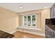 Bright dining area with large window and hardwood floors at 6338 S Oneida Ct, Centennial, CO 80111