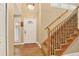 Welcoming foyer with hardwood floors and a staircase at 6338 S Oneida Ct, Centennial, CO 80111