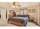 Relaxing main bedroom with a ceiling fan and large windows at 6338 S Oneida Ct, Centennial, CO 80111