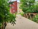 View of the condos over a small bridge at 2802 Sundown Ln # 103, Boulder, CO 80303