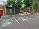 Parking lot with EV charging stations in front of the clubhouse building at 2802 Sundown Ln # 103, Boulder, CO 80303