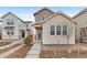 Charming exterior featuring neutral brick, well-manicured landscaping, and inviting entrance at 23820 E 34Th Ave, Aurora, CO 80019