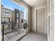 View from the balcony of nearby homes with black railings and a view of a blue sky at 11918 Mountview Ln, Broomfield, CO 80021
