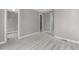 Spacious carpeted bedroom featuring neutral colors and an adjacent walk-in closet at 11918 Mountview Ln, Broomfield, CO 80021