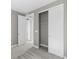 Bedroom featuring carpet, neutral paint, closet, and white doors at 11918 Mountview Ln, Broomfield, CO 80021