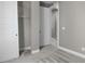 Bedroom featuring carpet, neutral paint, closet, and white doors at 11918 Mountview Ln, Broomfield, CO 80021