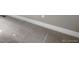 Close-up of light gray carpeting with white trim and gray wall at 11918 Mountview Ln, Broomfield, CO 80021