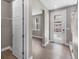 Hallway featuring hardwood floors with neutral paint and white accents at 11918 Mountview Ln, Broomfield, CO 80021