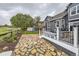 Beautiful backyard with nice lawn, rock area, and patio at 8862 Chestnut Hill Ln, Highlands Ranch, CO 80130