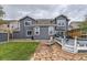 Backyard with patio and deck, great for outdoor living at 8862 Chestnut Hill Ln, Highlands Ranch, CO 80130