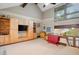 Large bonus room features a built-in media center and loft access at 33208 Alta Vista Dr, Evergreen, CO 80439