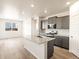 Modern kitchen with stainless steel appliances and granite countertops at 6050 Hourglass Dr, Brighton, CO 80601