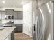 Kitchen with stainless steel appliances and granite countertops at 6050 Hourglass Dr, Brighton, CO 80601