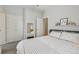 Bright bedroom with neutral paint, ensuite bathroom, and walk-in closet at 3444 Lawrence St, Denver, CO 80205