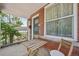 Cozy front porch with seating, perfect for relaxing and enjoying the neighborhood views at 3444 Lawrence St, Denver, CO 80205