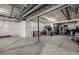 Unfinished basement providing ample space for storage or customization at 8230 S White Crow St, Aurora, CO 80016