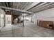 Large unfinished basement with access to stairs and ready for customization to create the ultimate entertaining space at 8230 S White Crow St, Aurora, CO 80016