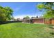 Large backyard with a well-manicured lawn, perfect for outdoor activities and entertaining at 6040 Taft Ct, Arvada, CO 80004
