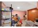 Basement storage area with exposed shelving and storage options at 6040 Taft Ct, Arvada, CO 80004