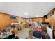 Unfinished basement with lots of extra storage space with carpet and paneled walls at 6040 Taft Ct, Arvada, CO 80004