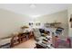 This room features a desk with lots of storage and plenty of light from a large window at 6040 Taft Ct, Arvada, CO 80004
