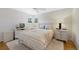 Serene bedroom with neutral décor, plush rug, and ample natural light from window at 6040 Taft Ct, Arvada, CO 80004
