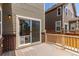 Private deck with sliding glass door, ideal for outdoor dining and relaxation at 14065 Harrison St, Thornton, CO 80602