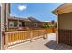 Outdoor deck area perfect for entertaining with views of neighboring houses at 14065 Harrison St, Thornton, CO 80602