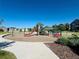 The community playground has multiple play structures and is surrounded by green space and modern homes at 14065 Harrison St, Thornton, CO 80602